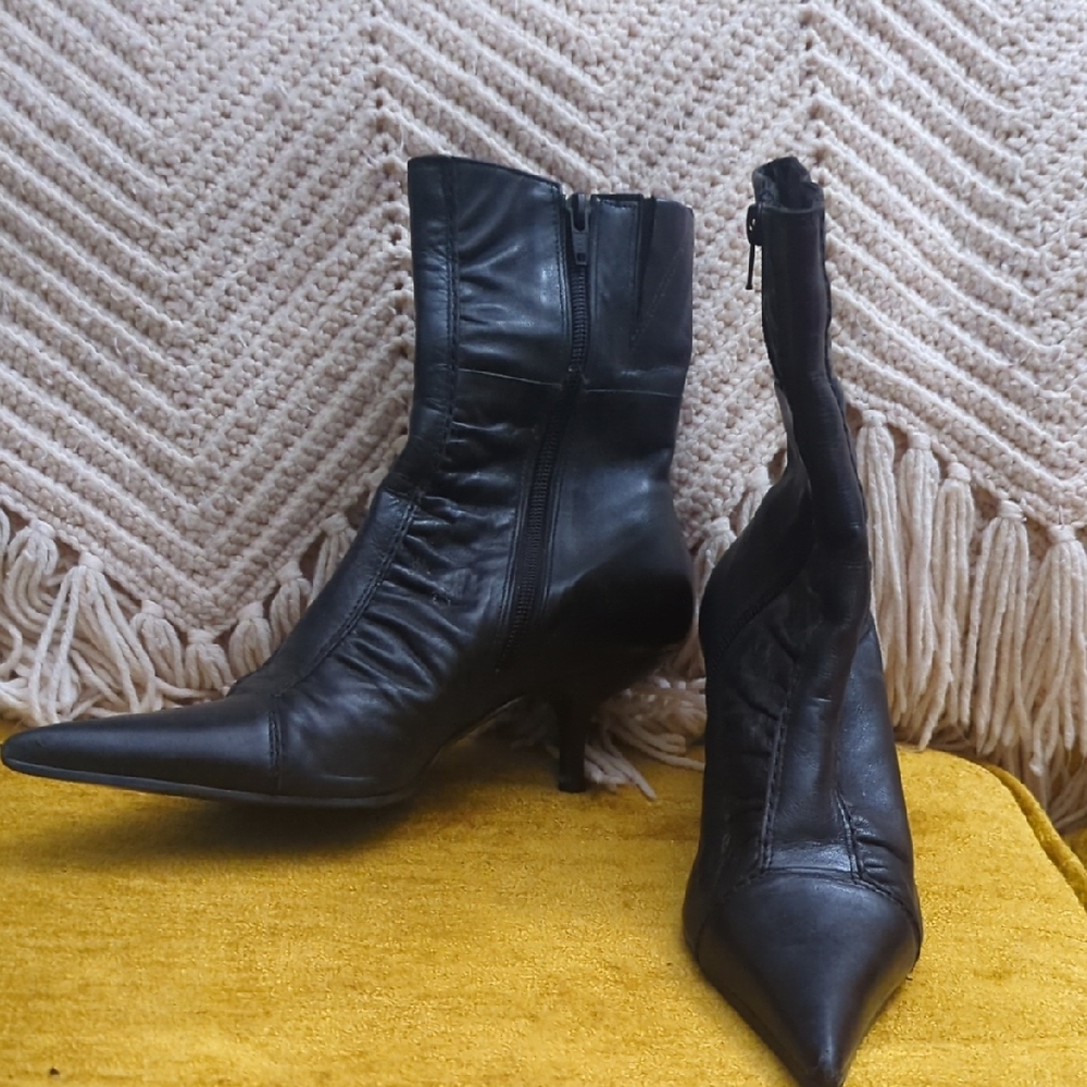 Sleek Black Leather Heeled Boots